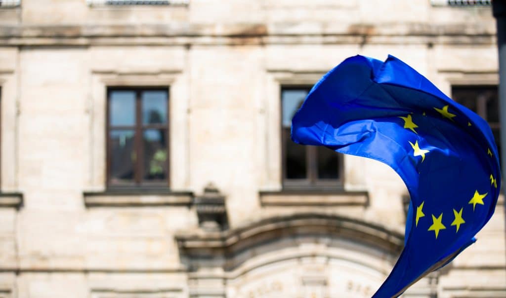 The eu flag waving with news of open borders to Candians