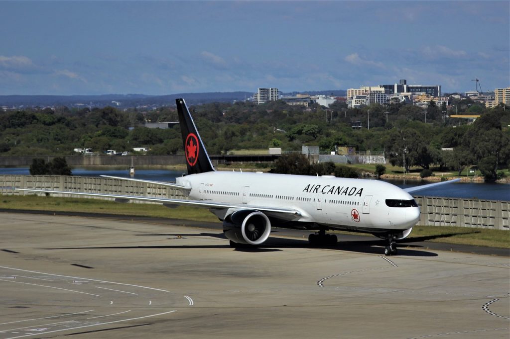 global travel restrictions are mess, air canadaa plane pictured on tarmac