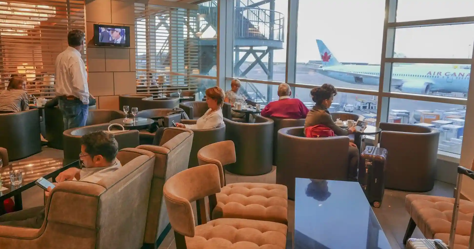 Business Lounge with couches and people