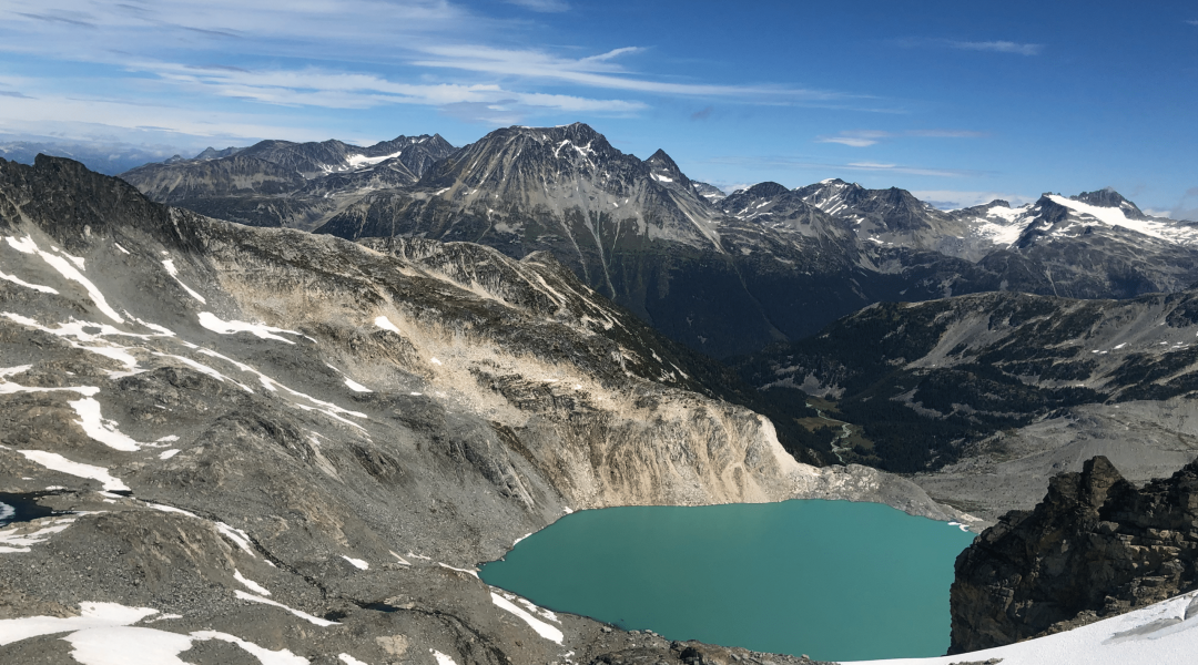 Blackcomb peak surrounded by lakes and mountains. Why worry about U.S. restriction extensions