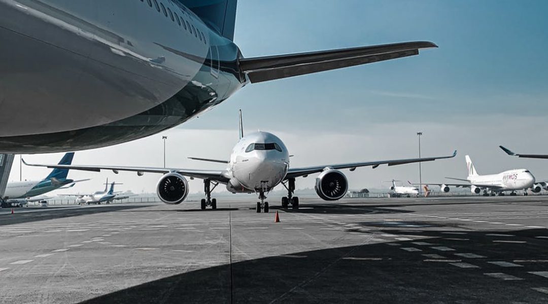 Travel and tourism coalition addresses government, planes on tarmac to signify international travel