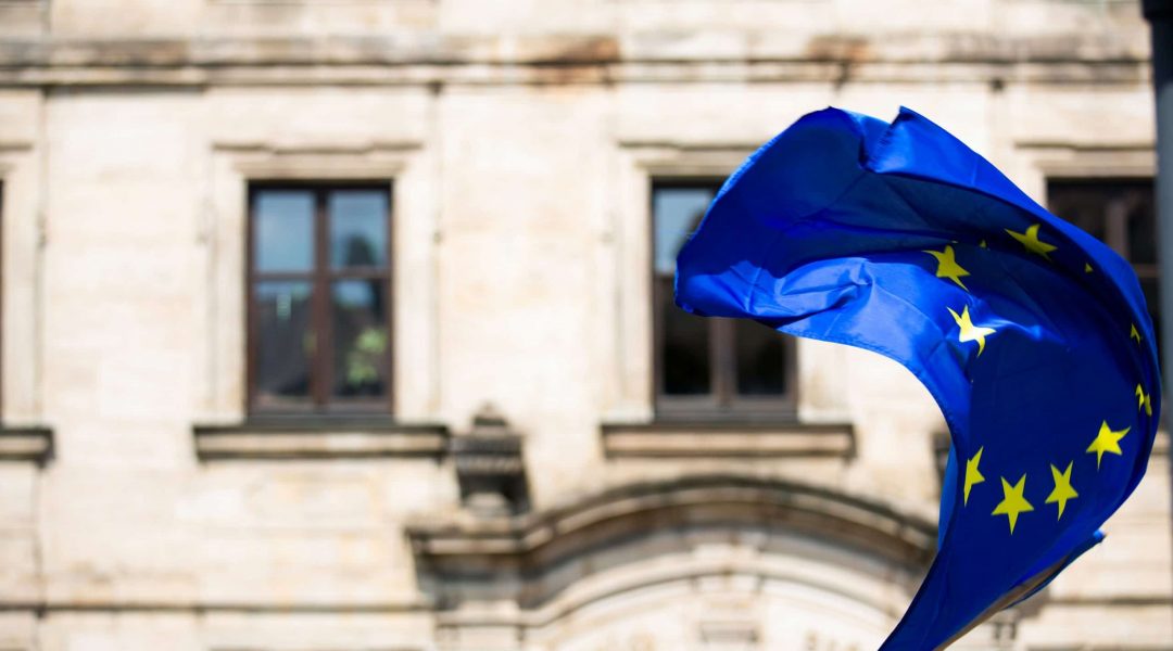 The eu flag waving with news of open borders to Candians