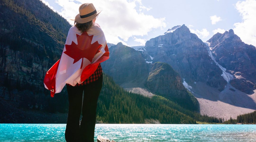 Canadian travellers looking over BC mountains